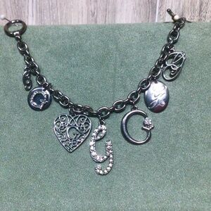 GUESS Silver Tone, Toggle Clasp, Multiple “G” Signature Charm Bracelet